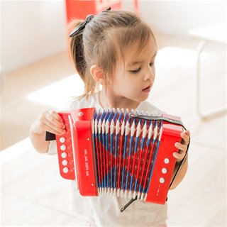 Accordion with music book - red